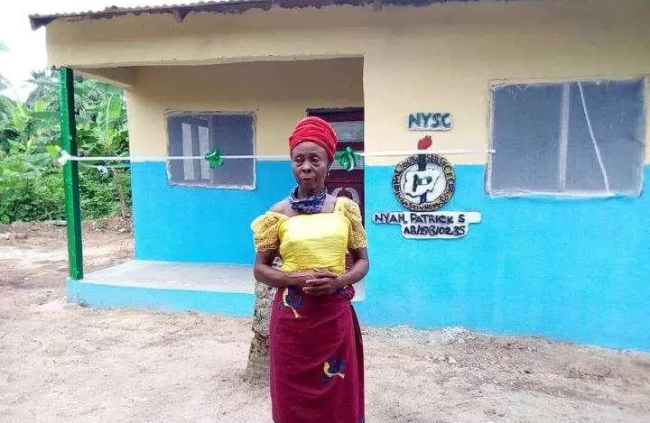 Corps Member Builds A House For A Widow Ejected By Her Landlord